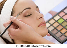 Beautiful Woman Having Make Up Applied by Beautician at Spa Beautiful Woman Having Make Up Applied by Beautician at Spa