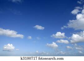 Blue beautiful sky with white clouds  in sunny day