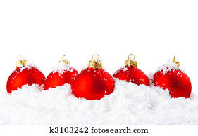 Christmas holiday decoration with white snow and red bowls Christmas holiday decoration with white snow and red bowls