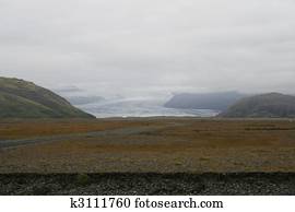 Glacier ending in rough terrain