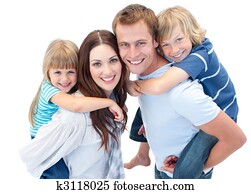 Happy parents giving their children a piggyback ride Happy parents giving their children a piggyback ride