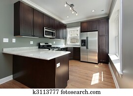 Kitchen with mahogany wood cabinetry Kitchen with mahogany wood cabinetry