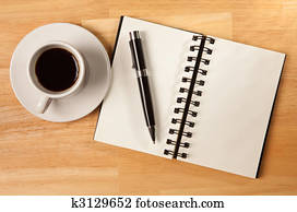 Blank Spiral Note Pad, Cup and Pen on Wood