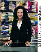 happy owner of a fabric store