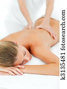 Jolly woman enjoying a massage