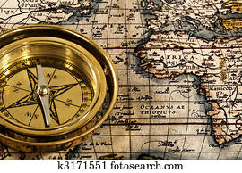 Adventure still life with retro navy compass and map Adventure still life with retro navy compass and map
