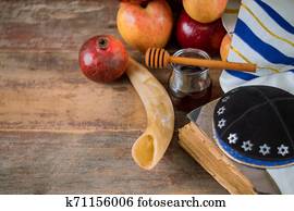 Honey and apples on jewish holiday Rosh Hashanah torah book, kippah a yamolka talit Honey and apples on jewish holiday Rosh Hashanah torah book, kippah a yamolka talit