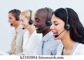 Multi-cultural business people working in a call center
