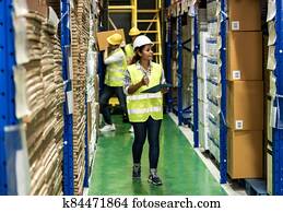 African warehouse manager working