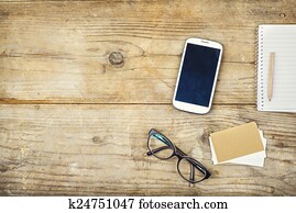 Desktop mix on a wooden office table.