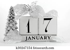 Save the Date vintage shabby chic block calendar with white winter theme snow covered pine tree, snowflake, and poinsettia flowers, for birthdays, events, weddings, or website events, for January 17. Save the Date vintage shabby chic block calendar with white winter theme snow covered pine tree, snowflake, and poinsettia flowers, for birthdays, events, weddings, or website events, for January 17.