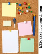 Blank memo notes on cork board