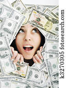woman looking trought hole on money bacground