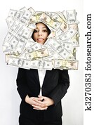 woman looking trought hole on money bacground