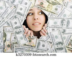 woman looking trought hole on money bacground