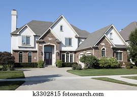 Brick home with arched entry