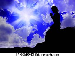 Woman praying to god