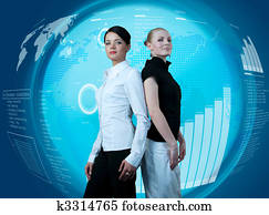 Attractive couple of businesswomen in futuristic interface Attractive couple of businesswomen in futuristic interface
