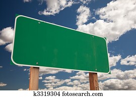 Blank Green Road Sign Over Clouds