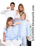 Jolly family brushing their teeth