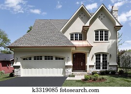 Luxury home with arched entry