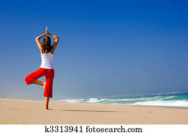Young woman making Yoga