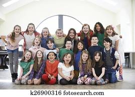 Large Group Of Children Enjoying Drama Workshop Together Large Group Of Children Enjoying Drama Workshop Together
