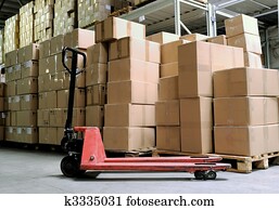 manual fork pallet truck in warehouse