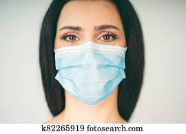 אישה יפה, דגמן, ללבוש, a, פרצופי, רפואי, הסתר