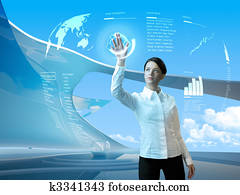 Attractive brunette with interface in futuristic interior Attractive brunette with interface in futuristic interior