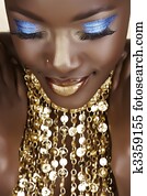African woman with gold