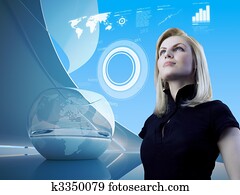 Attractive blonde with interface in future interior Attractive blonde with interface in future interior