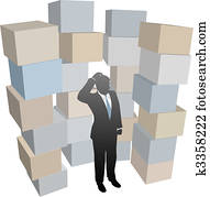 Business man in stacks of shipping boxes cartons Business man in stacks of shipping boxes cartons