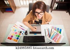 Cute freelance designer at work Cute freelance designer at work