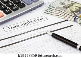 loan application form and dollar banknotes
