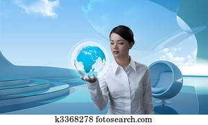 Attractive brunette holding future globe Attractive brunette holding future globe