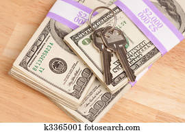 House Keys on Stack of Money