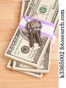 House Keys on Stack of Money