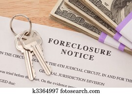 House Keys, Stack of Money and Foreclosure Notice