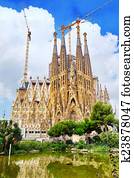 The Basilica of La Sagrada Familia against blue sky. The Basilica of La Sagrada Familia against blue sky.