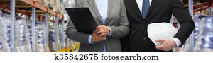 close up of business partners at warehouse close up of business partners at warehouse