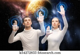 couple using touch screen over space background