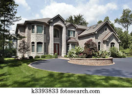 Luxury home with arched entry