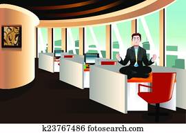 Businessman meditating in the office