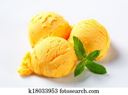 Scoops of mango sorbet Scoops of mango sorbet