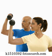 Woman and man exercising.