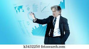 Businessman navigating interface in future Businessman navigating interface in future
