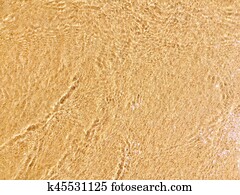 Sea waves reaching lapping to shore