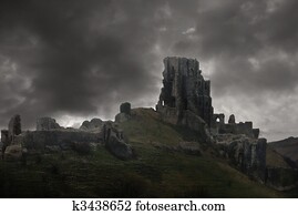 Storm above castle ruins