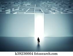 Businessman about to enter huge mysterious maze.. Challenge concepts Businessman about to enter huge mysterious maze.. Challenge concepts